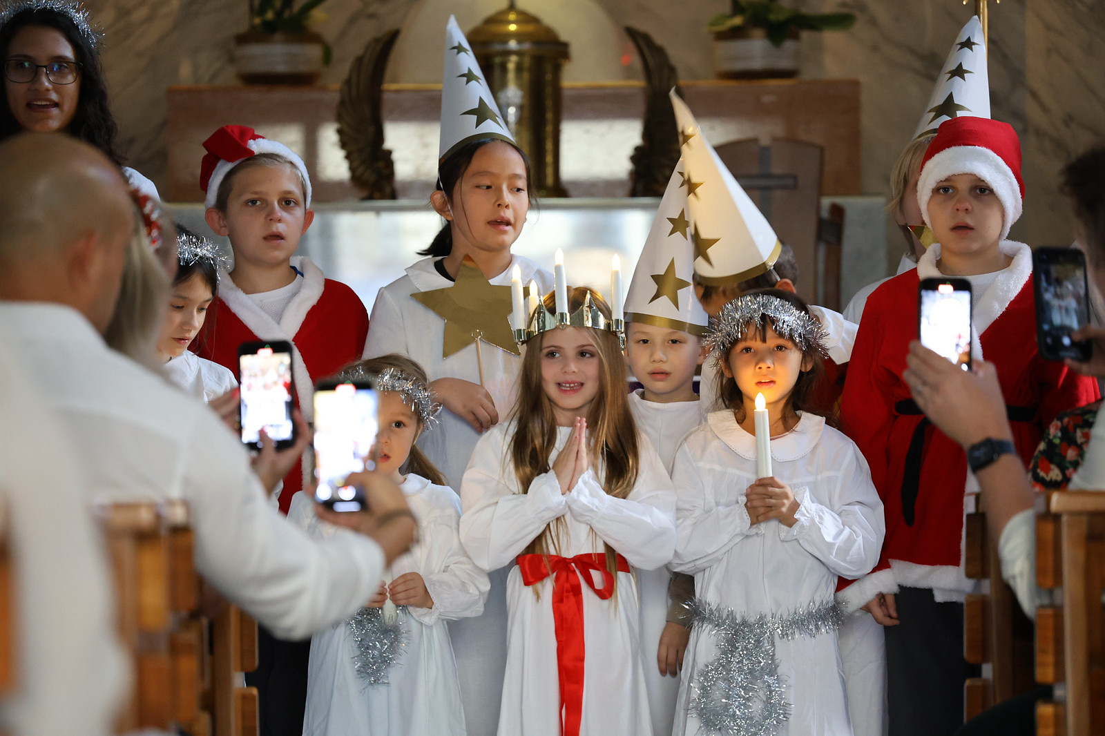 Lucia singers with candles